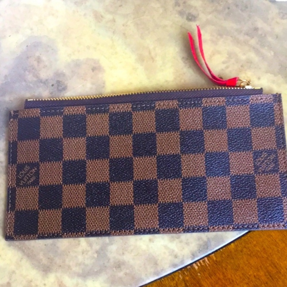 Damier ebene pattern pouch